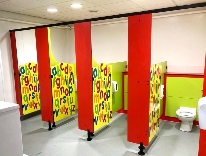 Rainbow ABC primary school toilet cubicles with alphabet printed doors
